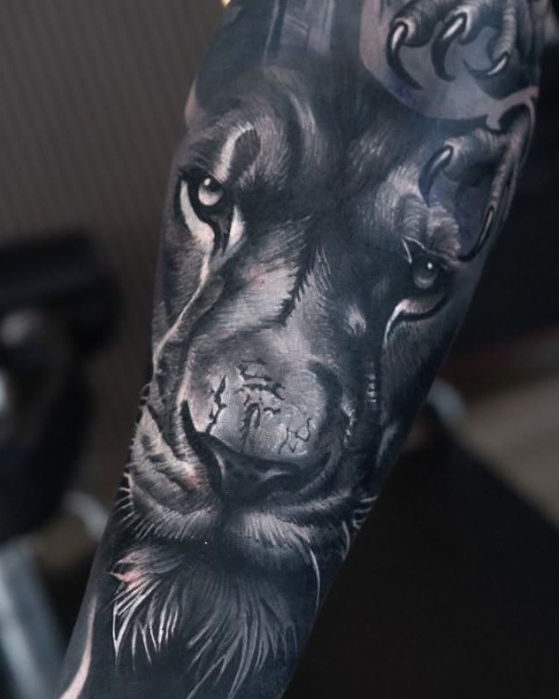 Realism lion sleeve tattoo